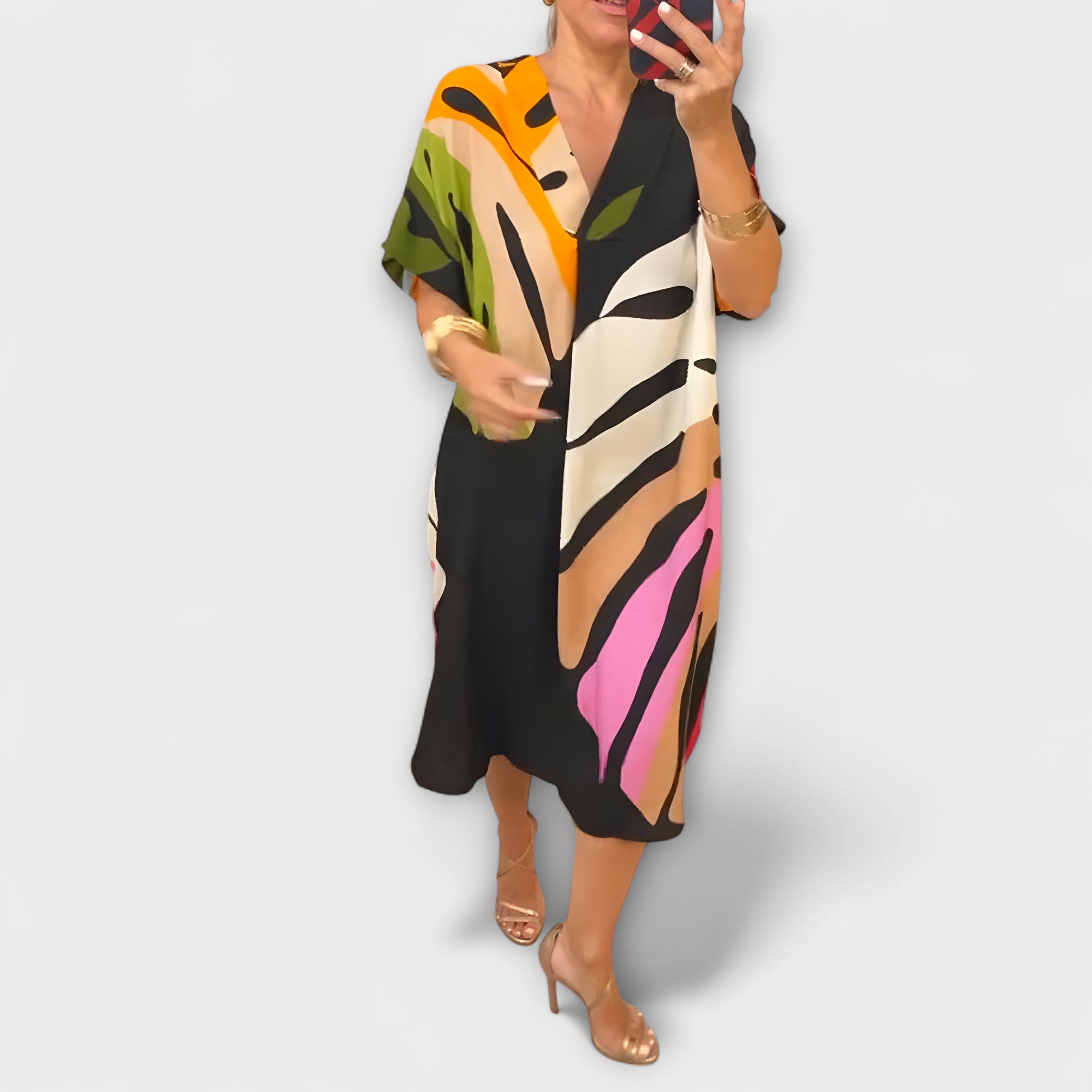 Roos - Lu?na sukienka z kolorowym nadrukiem li?ci