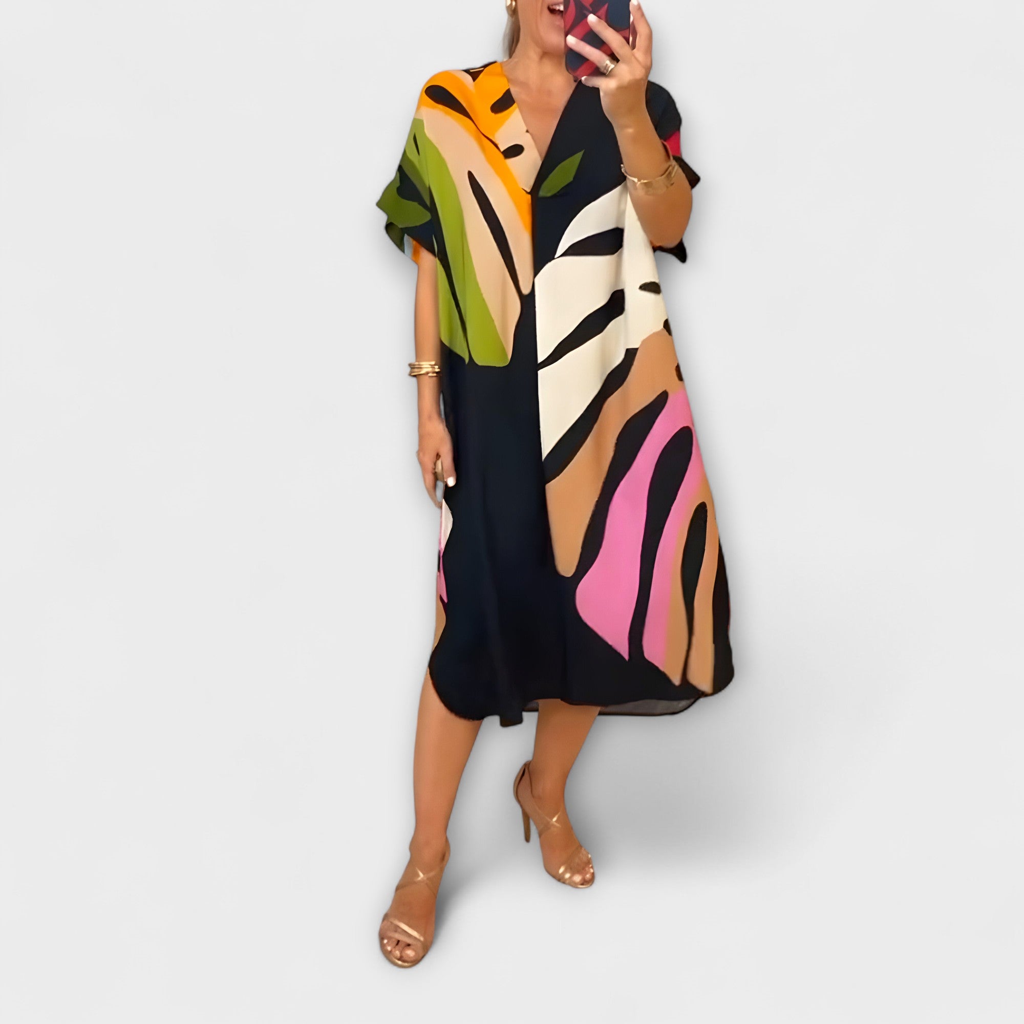 Roos - Lu?na sukienka z kolorowym nadrukiem li?ci