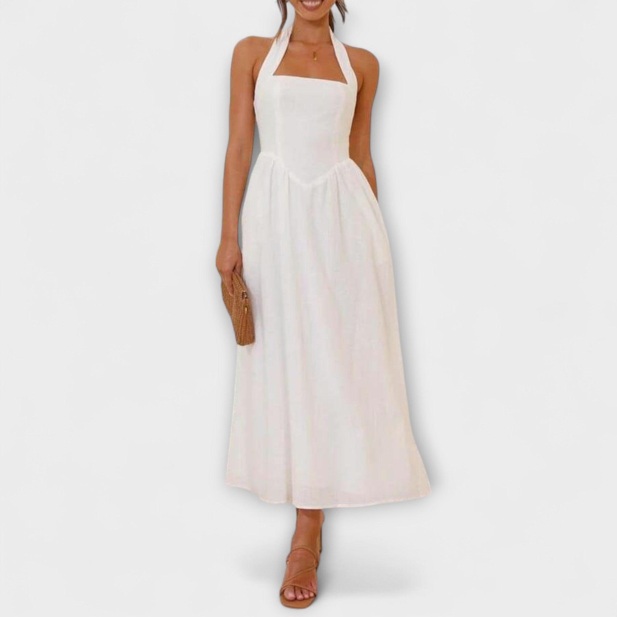 Lydia - sukienka typu halter o ?redniej d?ugo?ci z detalem w talii