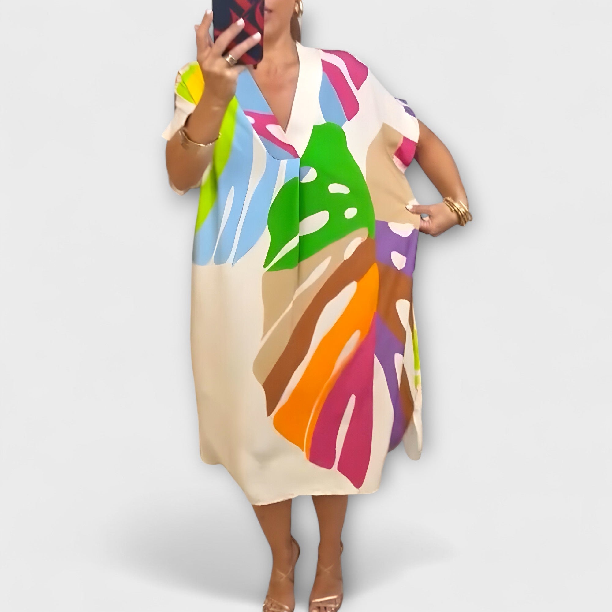 Roos - Lu?na sukienka z kolorowym nadrukiem li?ci